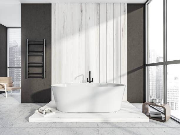 istock White wood and grey bathroom with oval ceramic bathtub 1362723416