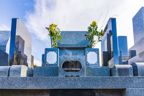 istock A stone tomb with beautiful flowers 1362724493