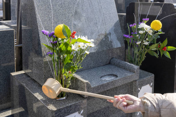 istock A stone tomb with beautiful flowers 1362724545