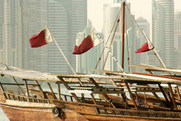 Doha Skyline, Boats and Flag stock photo