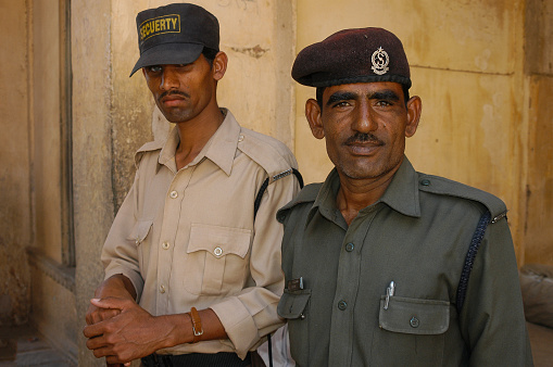 Rajasthan, India - February 25, 2006: Private security guards at the entrance to Nayla Fort