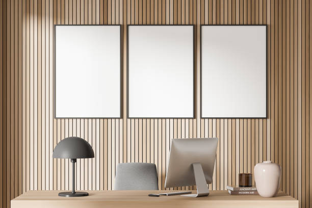 istock Wooden business room interior with desk and computer. Mockup posters 1362725775