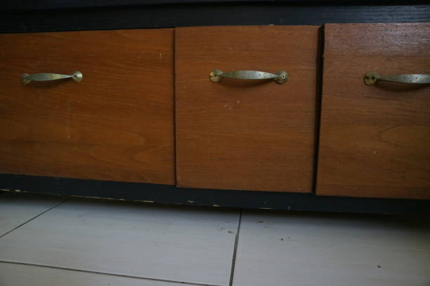 istock wooden television table with multiple curtains 1362729648