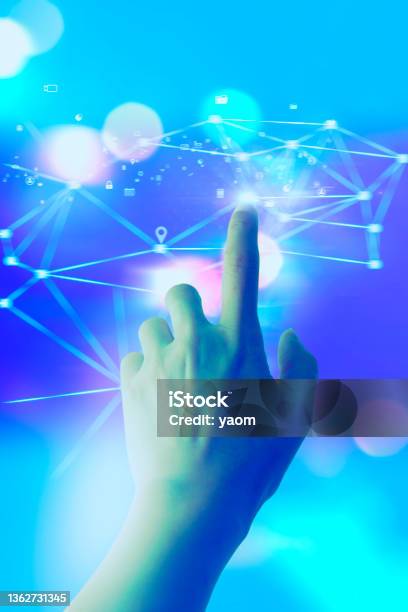 Technology Touch Growing Business Graph And Analysis Financial Data On Virtual Screen Nanohologram Created World At Our Fingertips Cyborg Hand Holding A Medical Icon Stock Photo - Download Image Now