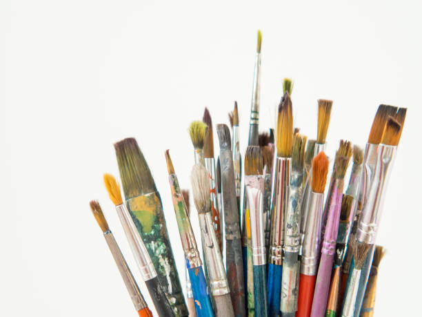 istock many different brushes for painting, artist's working brushes close-up, copy space 1362731766