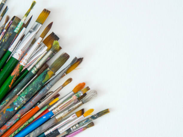 istock many different brushes for painting, artist's working brushes close-up, copy space 1362731771