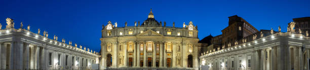 Panorama in Piazza San Pietro, or Saint Peters Square, during the blue hour with a view of the basilica stock photo
