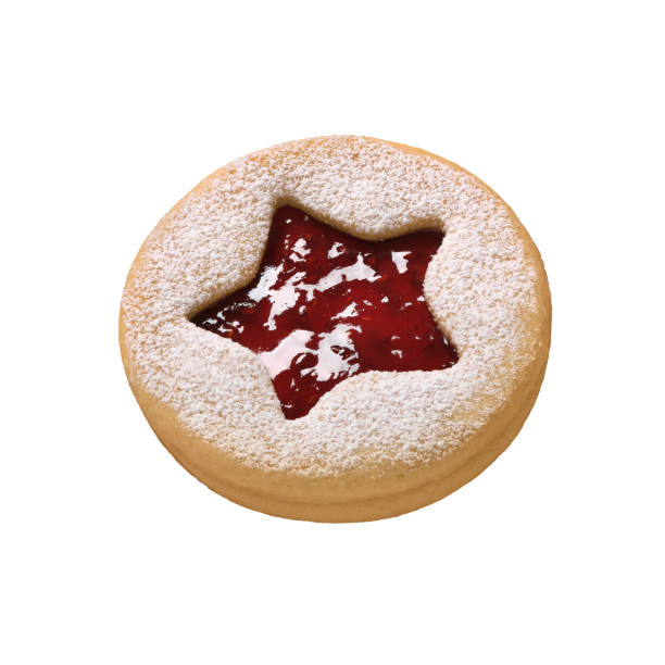 istock Traditional Christmas Linzer Cookie with raspberry jam isolated on white background. Homemad cookies close up 1362733380