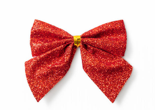 istock Red shiny festive bow isolated on white background 1362735528