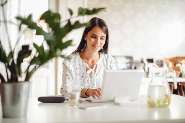 istock Young woman working in her offfice 1362736098