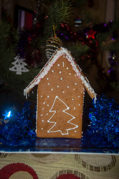istock gingerbread christmas house on a blue tray 1362736583