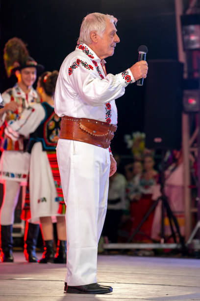 Timisoara: Old romanian singer in traditional costume, present at the international folk festival, International Festival of hearts; organized by the City Hall.