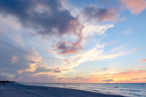 istock Beautiful colored cloudy evening sky. Sky with clouds at sunset. Seascape 1362738141