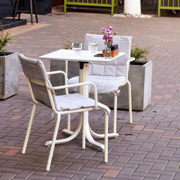 istock an empty table of an outdoor cafe 1362739136