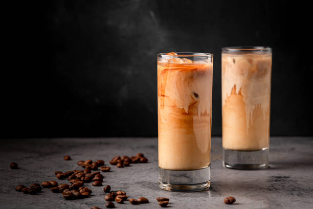 istock Ice coffee in a glass with cream poured over 1362739200
