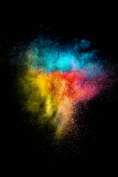 istock Explosion of colored, fluid and neoned powder on black studio background with copy space. Magazine cover, wallpaper design 1362740891