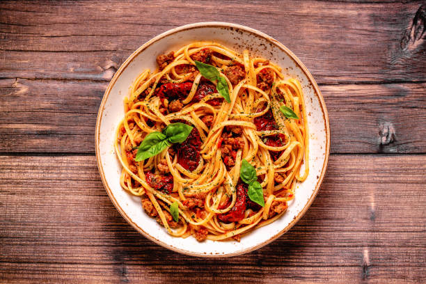 istock Pasta with bolognese sauce and sun-dried tomatoes 1362741102