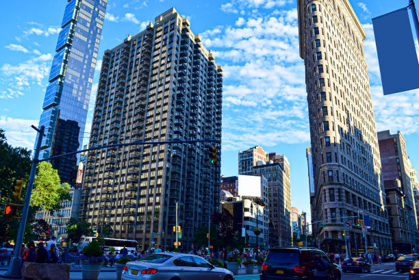 The Flatiron Building, originally the Fuller Building, is a triangular 22-story, 285-foot-tall steel-framed landmarked building located at 175 Fifth Avenue in the eponymous Flatiron District neighborhood of the borough of Manhattan, New York City