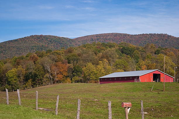 istock Red Barn Country Scene 136274339
