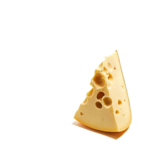 istock Piece of cheese with holes isolated on white background. 1362745151