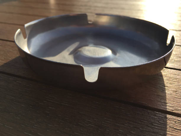 istock Ashtray on the wood table 1362746186
