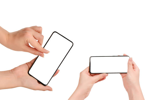 istock Smart phone in woman hands isolated on white background.  White screen. Copy space. 1362746710