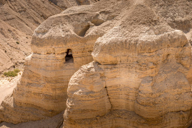 Qumran is an archaeological site in the West Bank. It is located on a dry marl plateau about 1.5 km (1 mi) from the northwestern shore of the Dead Sea, near the Israeli settlement and kibbutz of Kalya.