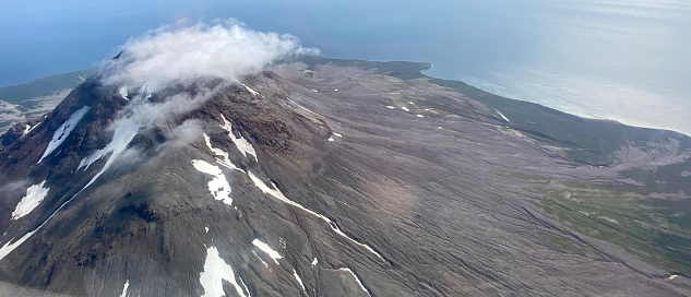 Aerial view of Augustine Volcano releasing steam, located on Augustine Island, near the Kenai Peninsula in Alaska, Iphone 11Pro