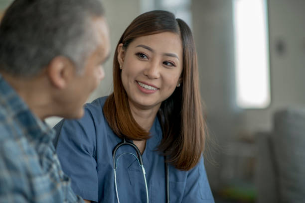 istock Homecare Nurse Talking with a Patient 1362755999