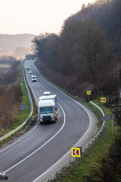 istock Road turns right and than left with the view 1362758711