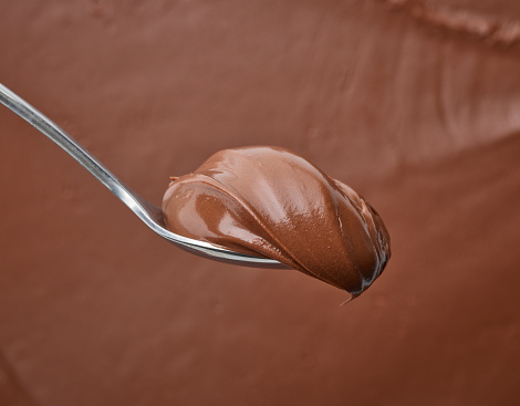 spoon of chocolate hazelnut cream macro