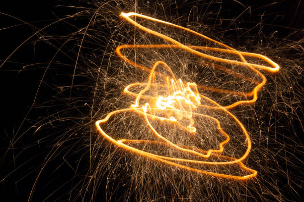 istock Sparks of sparkler in motion at long exposure 1362761886