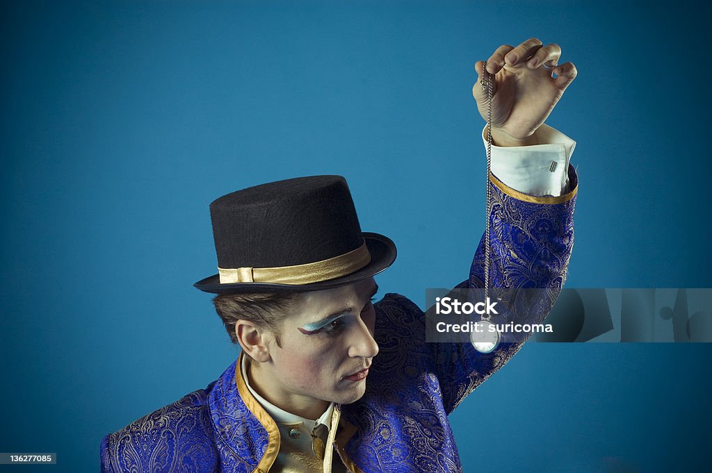 man with a clock man enters into hypnosis by means of a pocket watch Hypnosis Stock Photo