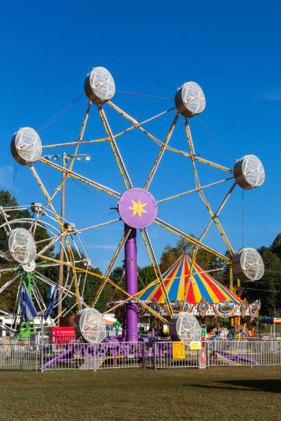 istock Old Ferris Wheel Ride and Carousel 1362774001