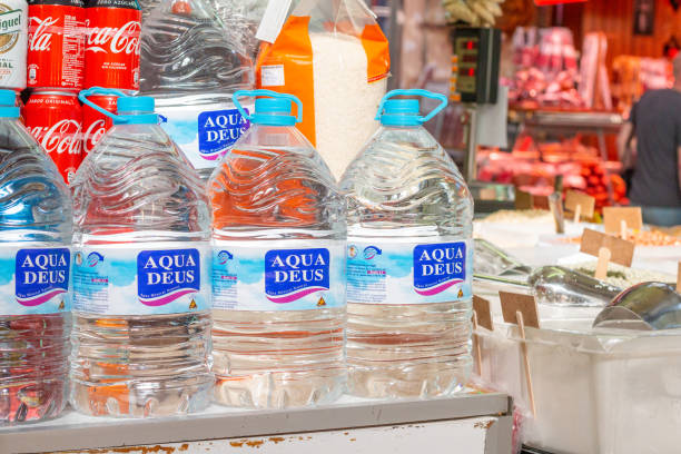 Bottled Water at Mercado Central (Central Market) in Valencia, Spain, with commercial labels visible.