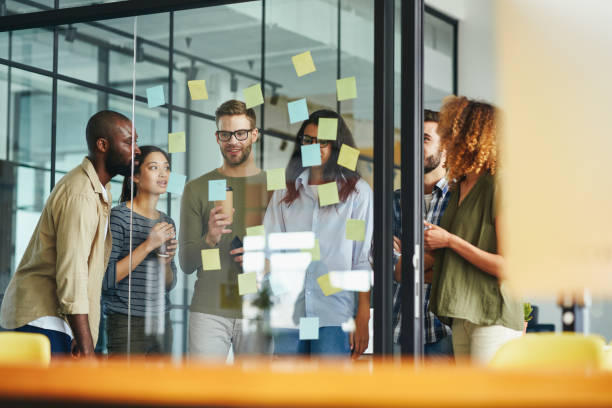 istock Inventive young men and women having a productive discussion 1362777243