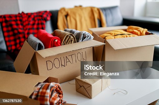 istock Donation box with stuff (blankets and clothes) 1362787530