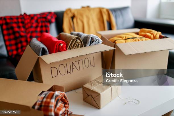 Donation Box With Stuff Stock Photo - Download Image Now - Charitable Donation, Donation Box, Charity and Relief Work