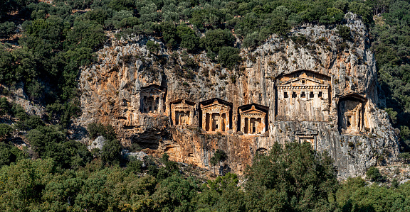Rock tombs of the kings at ancient city of Kaunos, a UNESCO world heritage site at Dalyan, Koycegiz, Mugla Province, Turkey.