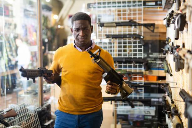 istock African-american man in airsoft shop 1362791849