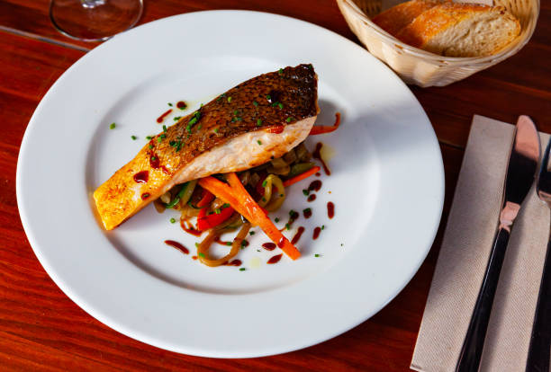 istock Baked salmon with sauteed vegetables 1362794044