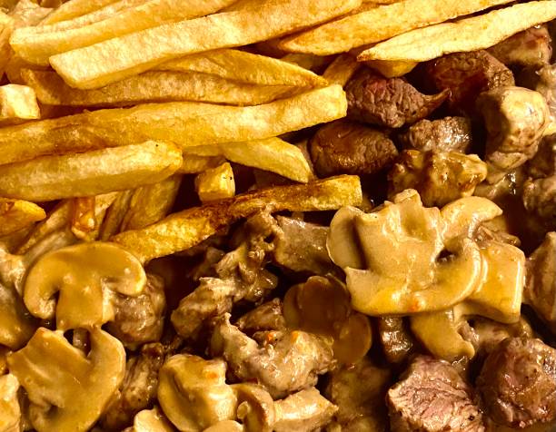 Traditional food Madeira Picado fries meat mushrooms Traditional food Madeira Picado fries meat mushrooms madeira sauce stock pictures, royalty-free photos & images