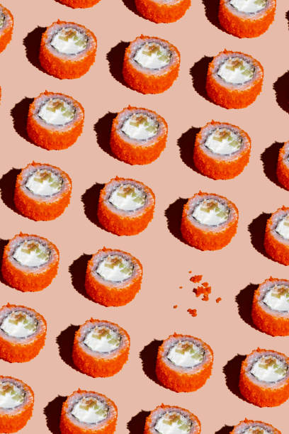 istock fresh traditional Japanese sushi rolls on a bright background 1362809169