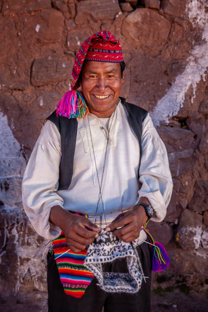 istock Man knitting hat on Taquile Island, Lake Titicaca, Peru 1362809609