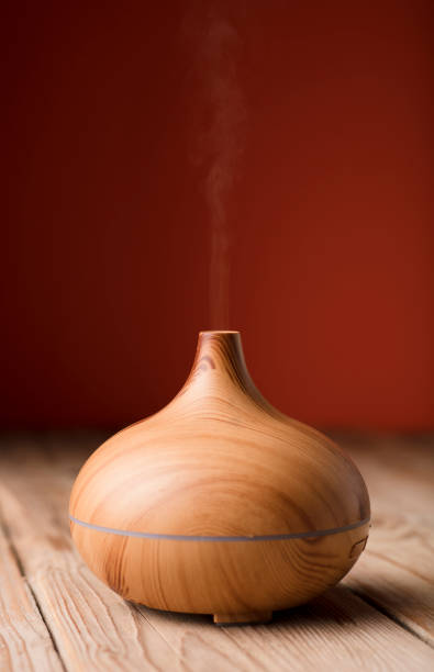 wooden air freshener with orange background
