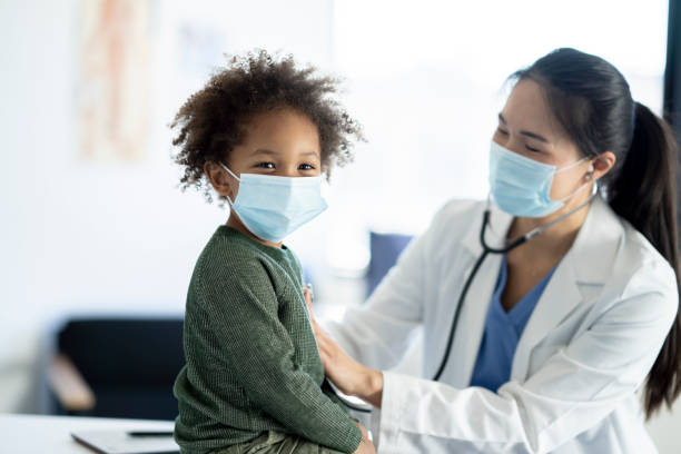 istock Listening to a Little Boys Heart 1362811121