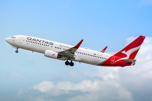 This image is of a Qantas Boeing 737-800 departing Brisbane International Airport. Qantas Airways Limited is the flag carrier of Australia and its largest airline by fleet size, international flights and international destinations. It is the world's third-oldest airline still in operation, having been founded in November 1920 it began international passenger flights in May 1935. Qantas is an acronym of the airline's original name, Queensland and Northern Territory Aerial Services, as it originally served Queensland and the Northern Territory, and is popularly nicknamed \