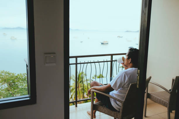 istock asian man drink coffee in the morning 1362827687