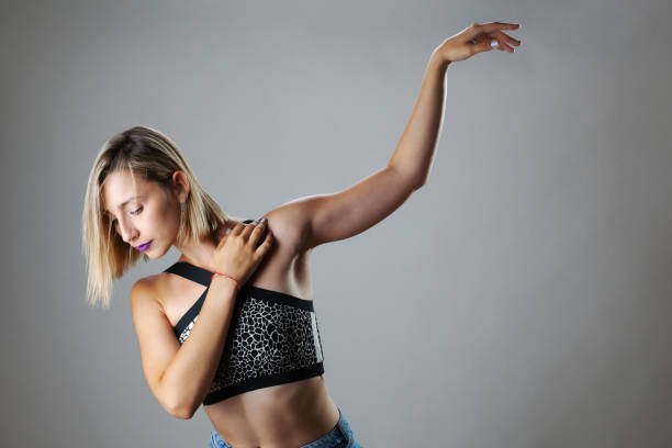 istock Beautiful blond girl making ballet pose. Studio portrait. 1362836045