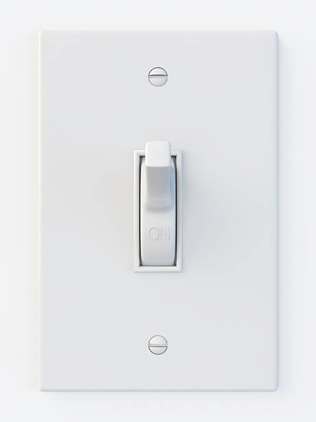 White light switch in the on position white light switch isolated on white background light switch stock pictures, royalty-free photos & images